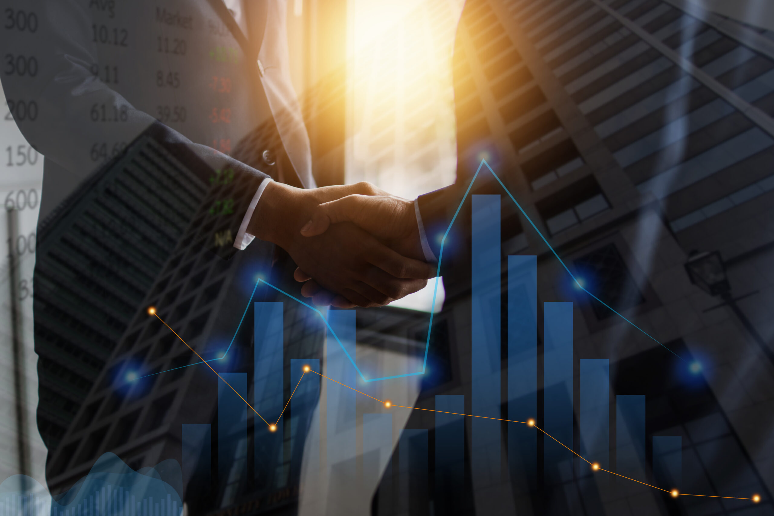 success and achievement of negotiate deal, business people shake