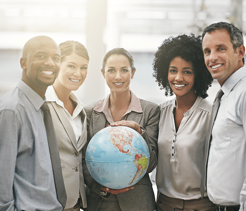 taking-world-by-storm-cropped-portrait-businesswoman-holding-globe-while-standing-with-her-colleagues